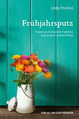 Buchcover Frühjahrsputz mit buntem Blumenstrauß in weißer Vase vor türkiser Holzwand, kunstundspiel München