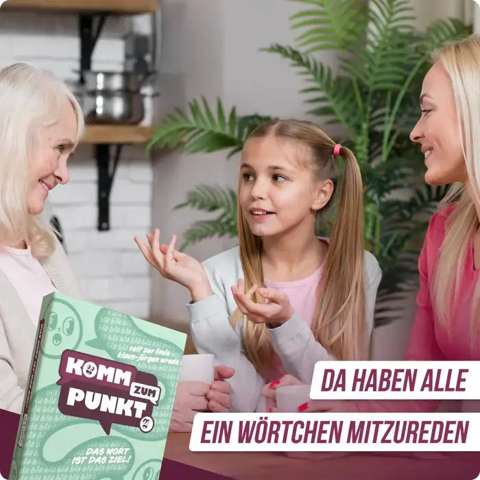 Familie spielt gemeinsam das Wortspiel 'Komm zum Punkt' – nachhaltiges Spielzeug für Kinder
